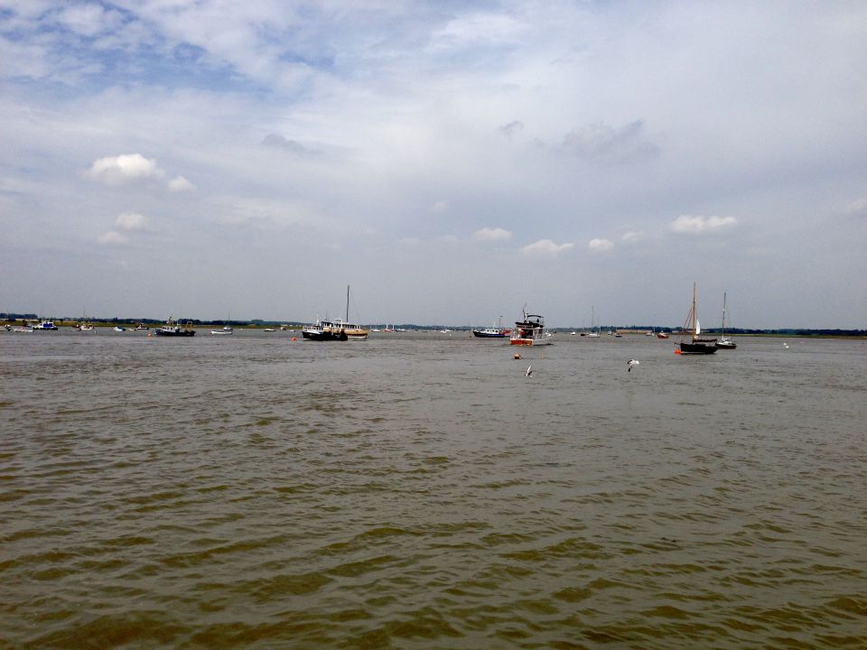 Crossing the River Deben lookin upstream, los of boats bobbing about
